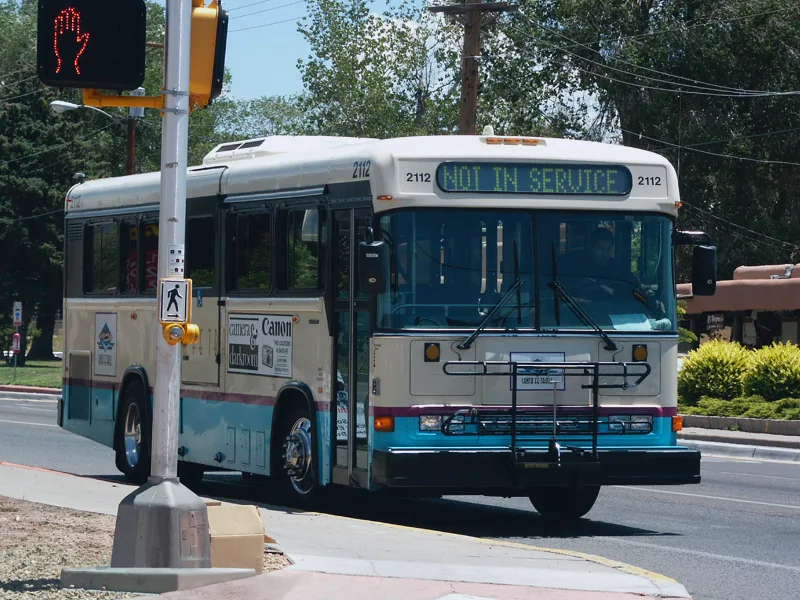 A Santa Fe Trails bus travelling along Cerrillos Road.