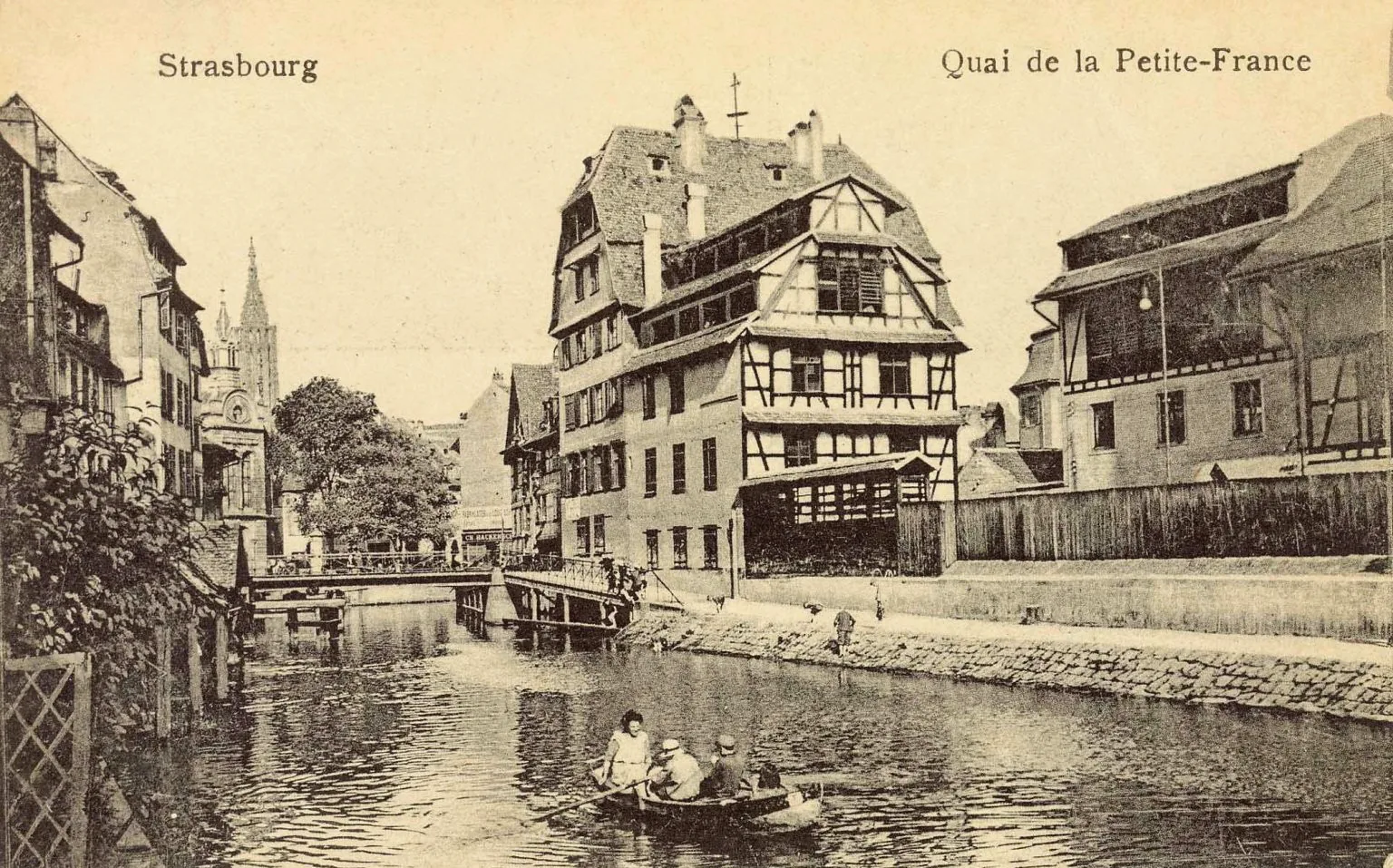 Historic view of the Quai de la Petite France beside the water in Strasbourg.