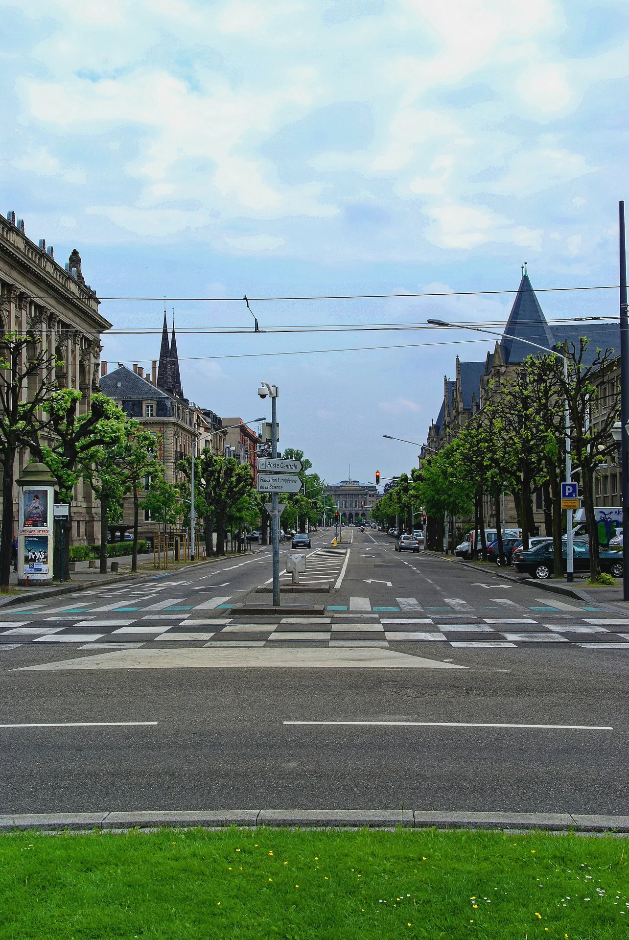 The tree-lined Avenue de la Liberté in Strasbourg, with buildings along the road.