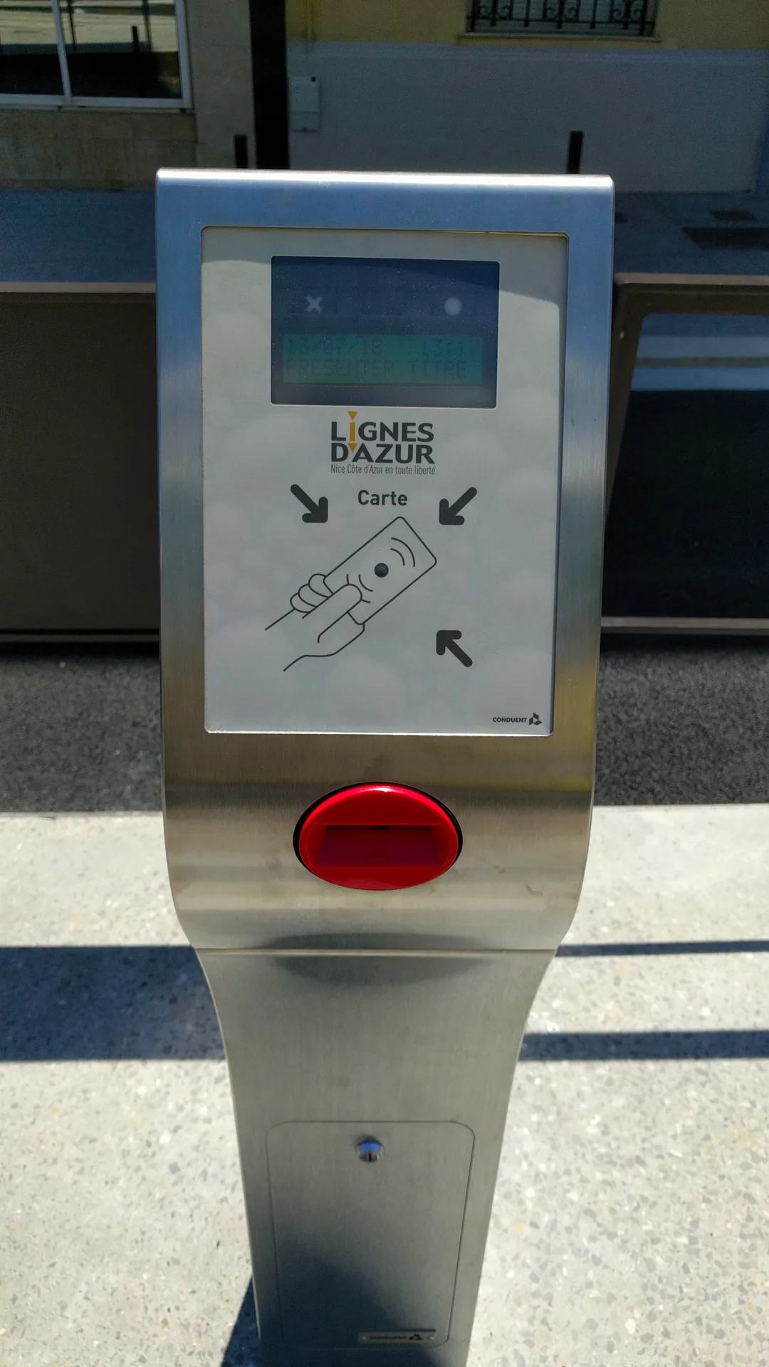 A ticket validator aboard or beside a Nice tram.