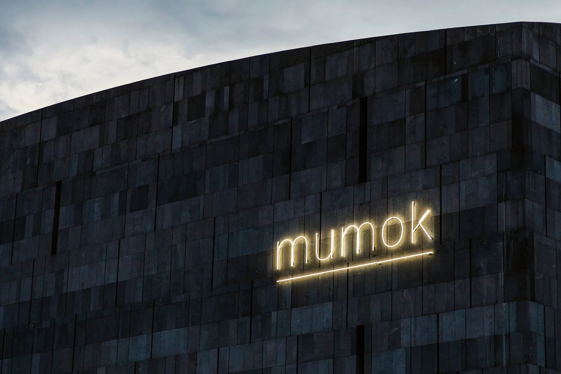 The dark, angular façade of the mumok museum in Vienna’s MuseumsQuartier.