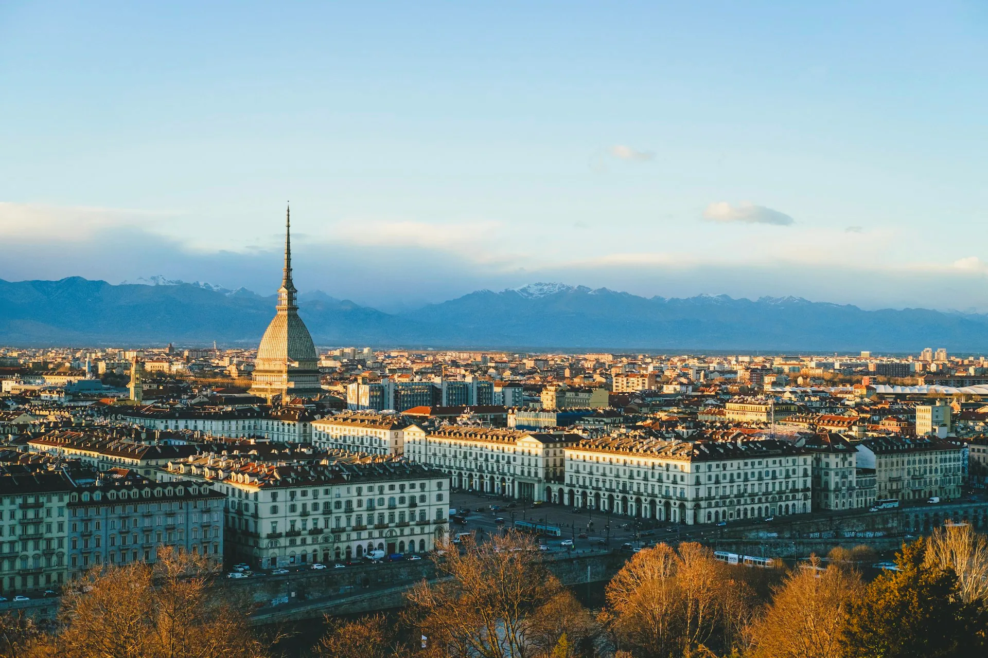 Aerial view across Turin’s city buildings in daylight.